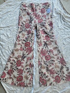 We The Free High-Rise Floral Flare Jeans in Cream and Pink